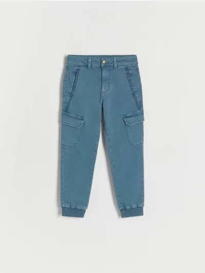 Reserved Spodnie typu jogger cargo, wykonane z bawełnianej tkaniny z dodatkiem elastycznych włókien. - niebieski