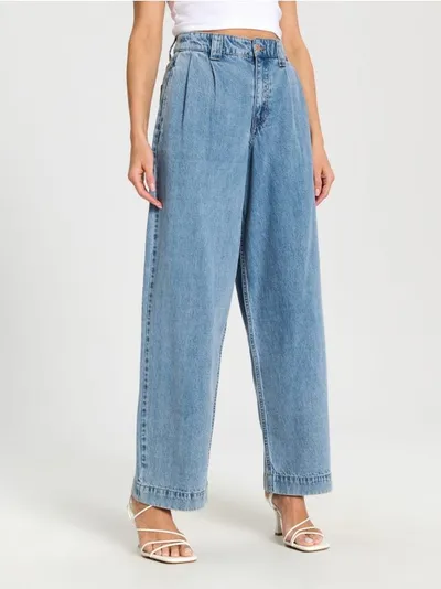 Sinsay Spodnie jeansowe o kroju wide leg uszyte z bawełny z dodatkiem elastycznego materiału. - niebieski