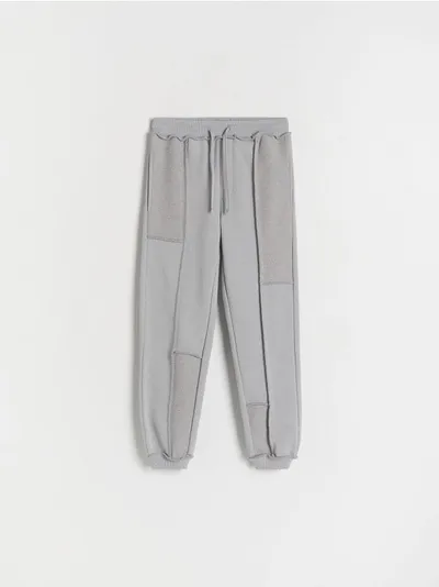Reserved Spodnie typu jogger, wykonane z dresowej dzianiny z bawełną. - jasnoszary