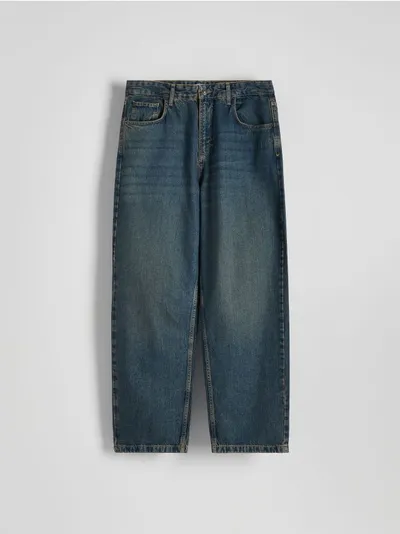 Reserved Jeansy o luźnym kroju, wykonane z denimu. - niebieski