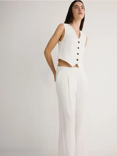 Reserved Spodnie o swobodnym fasonie, wykonane z lnu i wiskozy. - biały