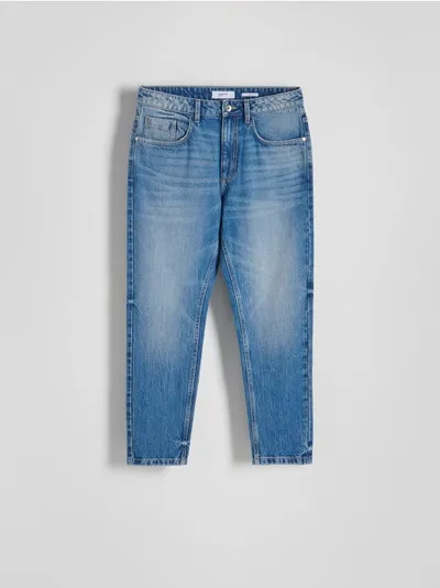 Reserved Spodnie jeansowe typu carrot, wykonane z denimu. - niebieski