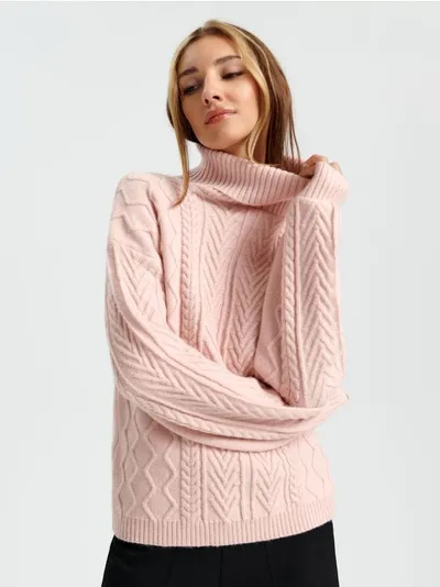 Sinsay Miękki sweter z golfem oraz z ozdobnym splotem, uszyty z łatwego w pielęgnacji materiału. - różowy