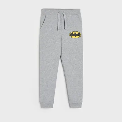 Sinsay Spodnie dresowe jogger Batman - Jasny szary