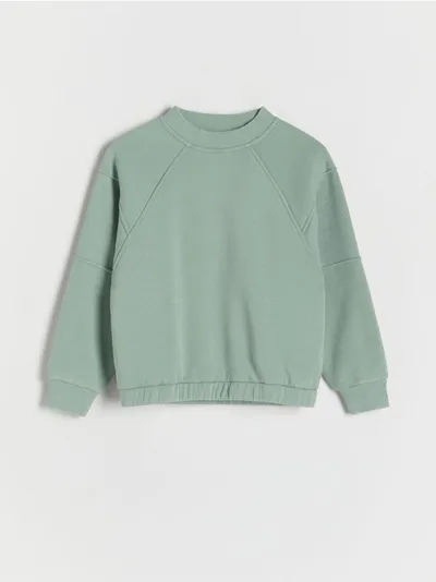 Reserved Bluza o luźnym kroju, wykonana z ciepłej dzianiny z bawełną. - zielony