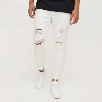House Białe jeansy slim fit z przetarciami - Biały