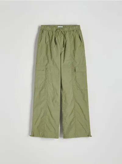 Reserved Spodnie typu jogger, wykonane z bawełnianej tkaniny. - zielony