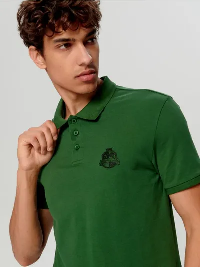 Sinsay Bawełniana koszulka polo o regularnym kroju z nadrukiem z filmu Harry Potter. - zielony