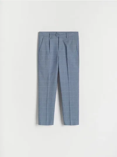 Reserved Eleganckie spodnie o dopasowanym fasonie, uszyte z miękkiej tkaniny z domieszką wiskozy. - niebieski