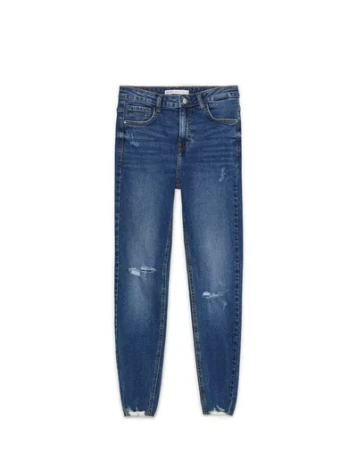 Cropp Ciemnoniebieskie jeansy skinny z postrzępieniem