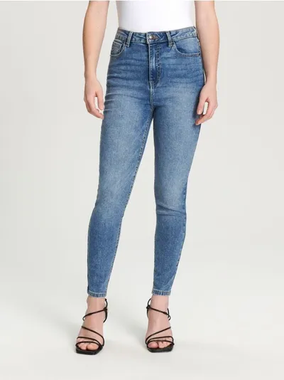 Sinsay Spodnie jeansowe skinny z wysokim stanem, wykonane z bawełny z domieszką elastycznych włókien. - niebieski