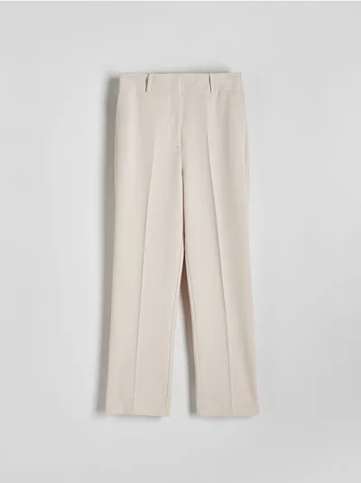 Reserved Spodnie typu cygaretki z prostą nogawką, wykonane z tkaniny z wiskozą. - beżowy