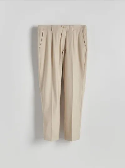 Reserved Spodnie garniturowe o dopasowanym kroju z kolekcji PREMIUM, wykonane z tkaniny z wiskozą. - beżowy