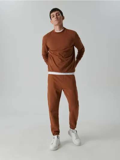 Sinsay Bawełniane spodnie o kroju jogger. - pomarańczowy