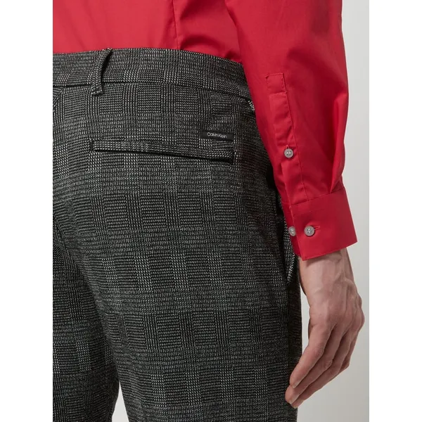CK Calvin Klein Spodnie z zakładkami o kroju tapered fit z dodatkiem streczu