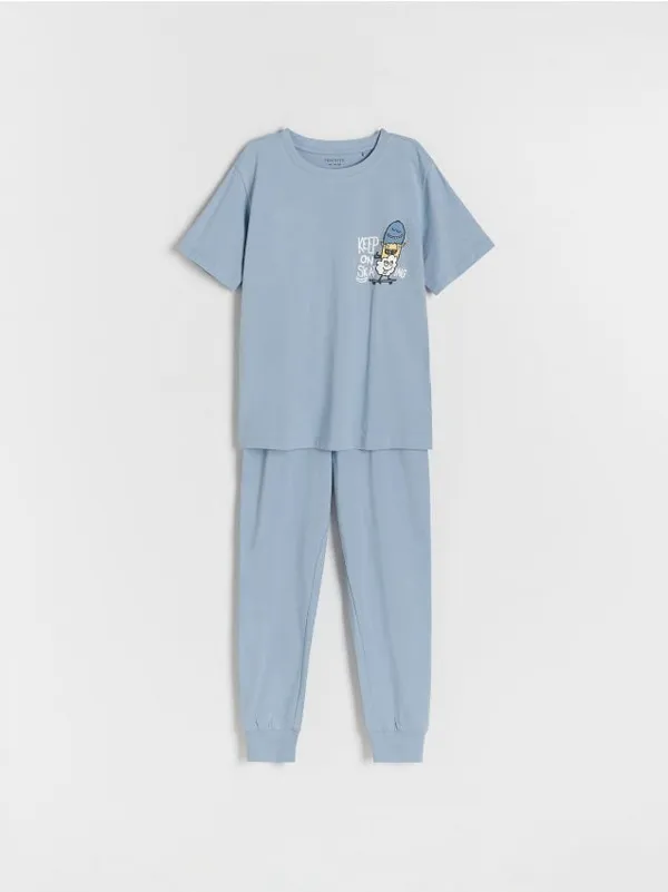 Dwuczęściowa piżama o prostym fasonie, wykonana z bawełnianej dzianiny. - niebieski