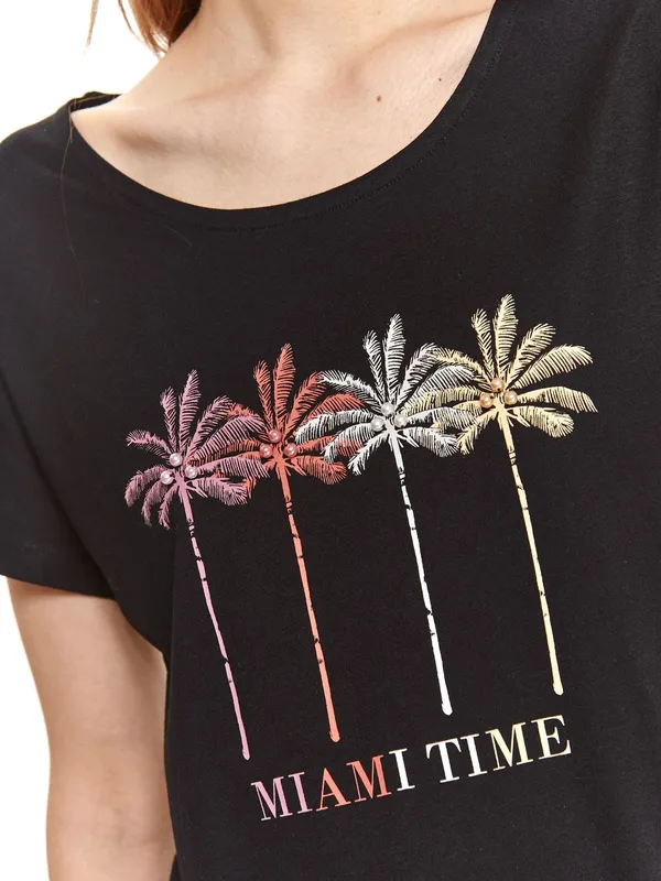 T-shirt damski z nadrukiem w palmy
