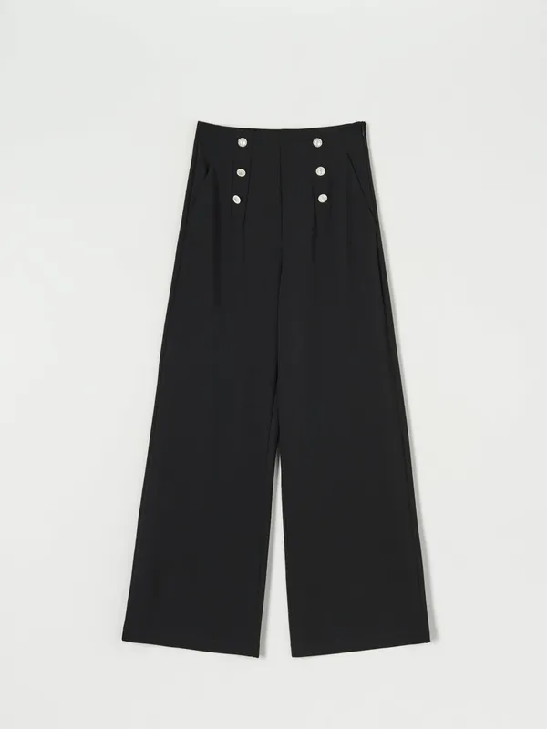 Spodnie z ozdobnymi guzikami, uszyte z odpornego na blaknięcie materiału z domieszką elastycznych włókien. - czarny
