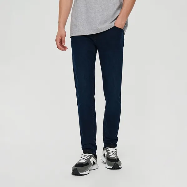 Ciemnogranatowe spodnie jeansowe slim fit - Niebieski