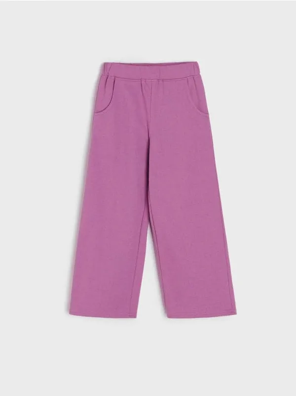 Wygodne, szerokie spodnie wykonane z miękkiej, bawełnianej dzianiny. - fioletowy