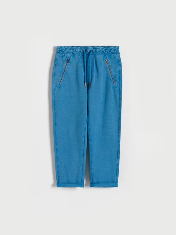 Spodnie dresowe z efektem sprania - Niebieski