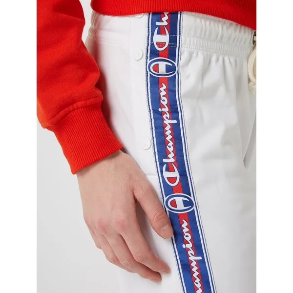 CHAMPION Spodnie typu track pants z listwą guzikową