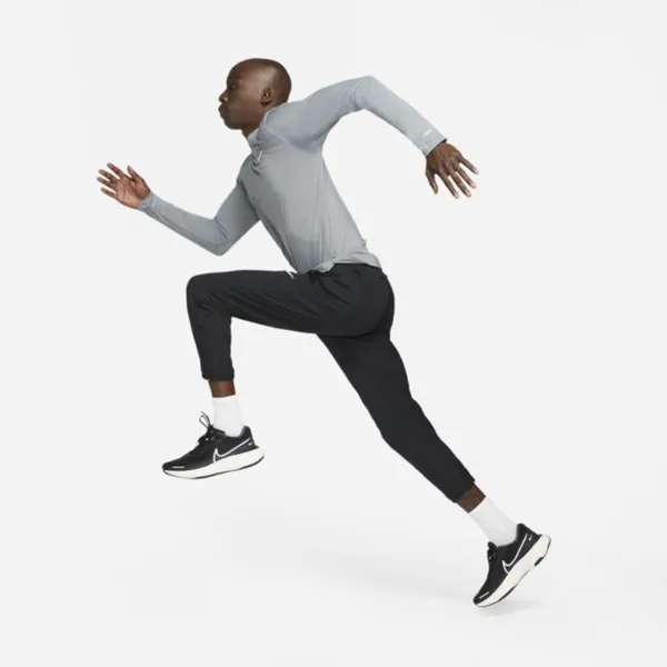 Męskie spodnie do biegania z tkaniny Nike Dri-FIT Challenger - Czerń