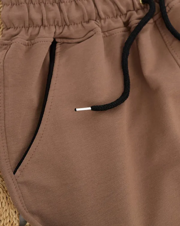 Damskie spodnie dresowe w kolorze brązowym- Odzież - Brązowy