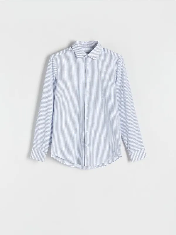Koszula o dopasowanym kroju, wykonana z bawełnianej tkaniny. - niebieski