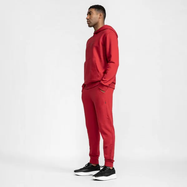 Męskie spodnie dresowe z bawełny organicznej 4F x RL9 RL9AW22TTROM256 - czerwone