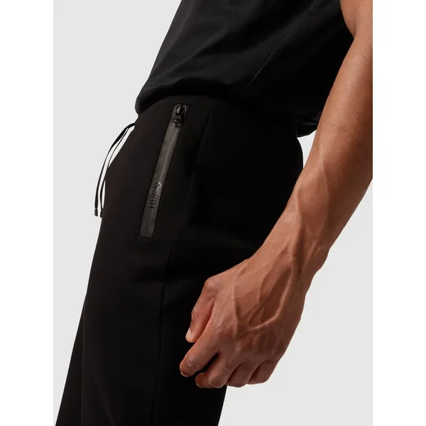 HUGO Spodnie dresowe z kieszeniami zapinanymi na zamek błyskawiczny model ‘Darey’