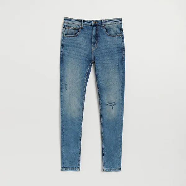 Niebieskie jeansy skinny fit z przetarciami - Niebieski