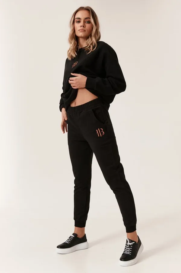 Sportowe spodnie damskie dresowe joggersy z kieszeniami — Badura