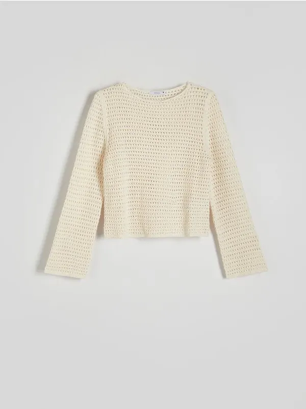 Sweter o pudełkowym fasonie, wykonany z bawełnianej dzianiny. - kremowy