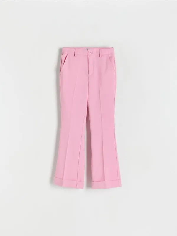 Spodnie typu flare, wykonane z tkaniny z dodatkiem wiskozy i elastycznych włókien. - różowy
