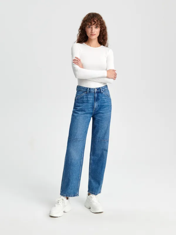 Spodnie jeansowe z ozdobnymi przeszyciami, uszyte w 100% z bawełny. - niebieski