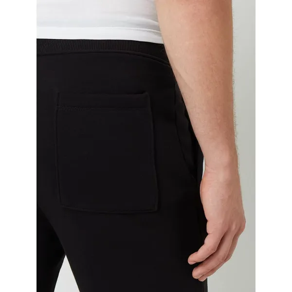 HUGO Spodnie dresowe z nadrukiem z logo model ‘Dabru’