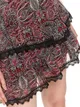 Tkaninowa spódniczka mini we wzory wykończona koronką