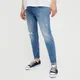 Niebieskie jeansy slim fit z efektem sprania i przetarciami - Niebieski