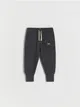 Dresowe spodnie typu jogger, wykonane z gładkiej, bawełnianej dzianiny. - ciemnoszary