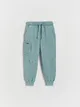 Spodnie typu jogger, wykonane z przyjemnej w dotyku, bawełnianej dzianiny. - niebieski