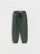 Dresowe spodnie typu jogger, wykonane z przyjemnej w dotyku, bawełnianej dzianiny. - ciemnozielony