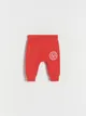 Spodnie typu jogger, wykonane z bawełnianej dzianiny. - czerwony