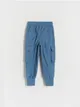 Spodnie typu jogger, wykonane z gładkiej tkaniny z bawełną. - niebieski