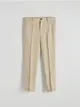 Garniturowe spodnie z kolekcji PREMIUM o dopasowanym kroju, wykonane z lnu. - beżowy