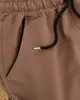 Damskie spodnie dresowe w kolorze brązowym- Odzież - Brązowy