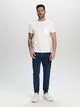 Wygodne jeansy cargo slim jogger uszyte z bawełny z dodatkiem elastycznych włókien. - niebieski