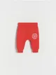 Spodnie typu jogger, wykonane z bawełnianej dzianiny. - czerwony