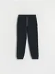 Dresowe spodnie typu jogger, wykonane z miękkiej dzianiny z bawełną. - czarny