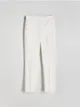 Spodnie typu cygaretki, uszyte z tkaniny z dodatkiem bawełny. - biały